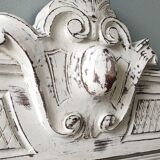 Old pediment in painted wood