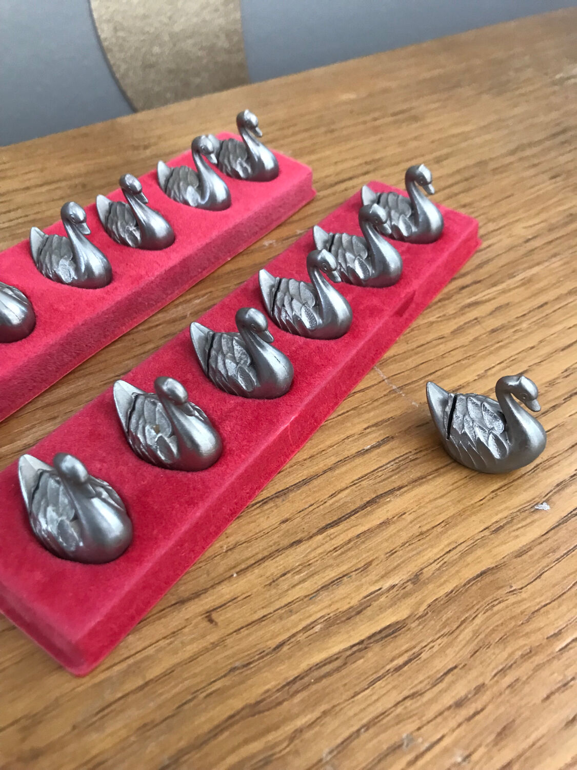 Thirteen metal swan named holder