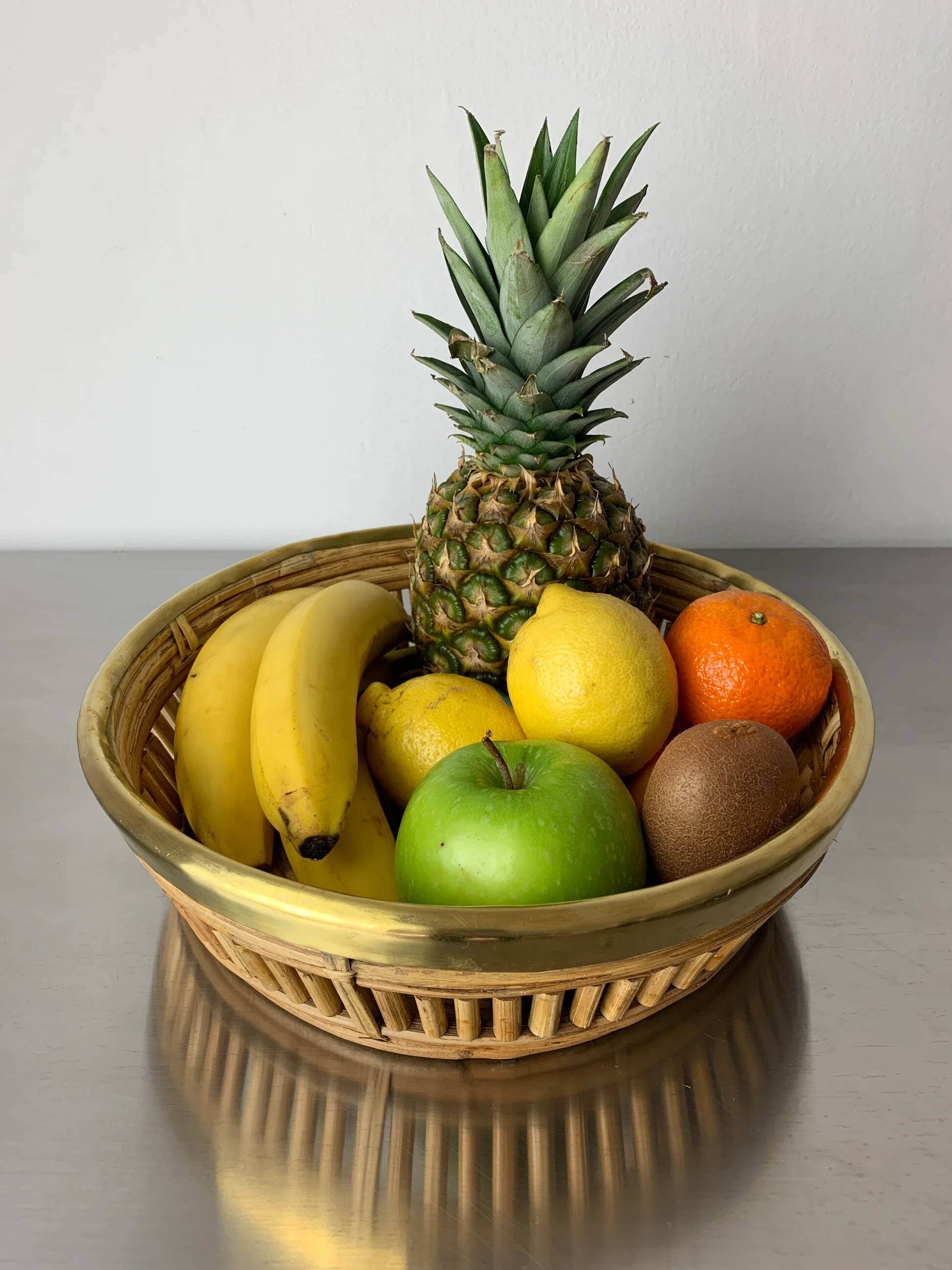 Circular rattan and brass basket, Italy, 1970