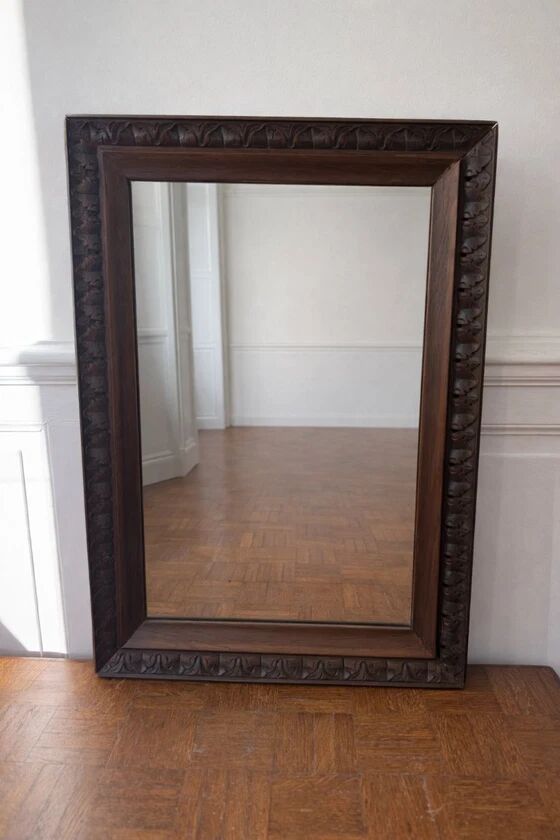 Antique carved wooden mirror