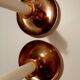 Pair of brass hand candlesticks