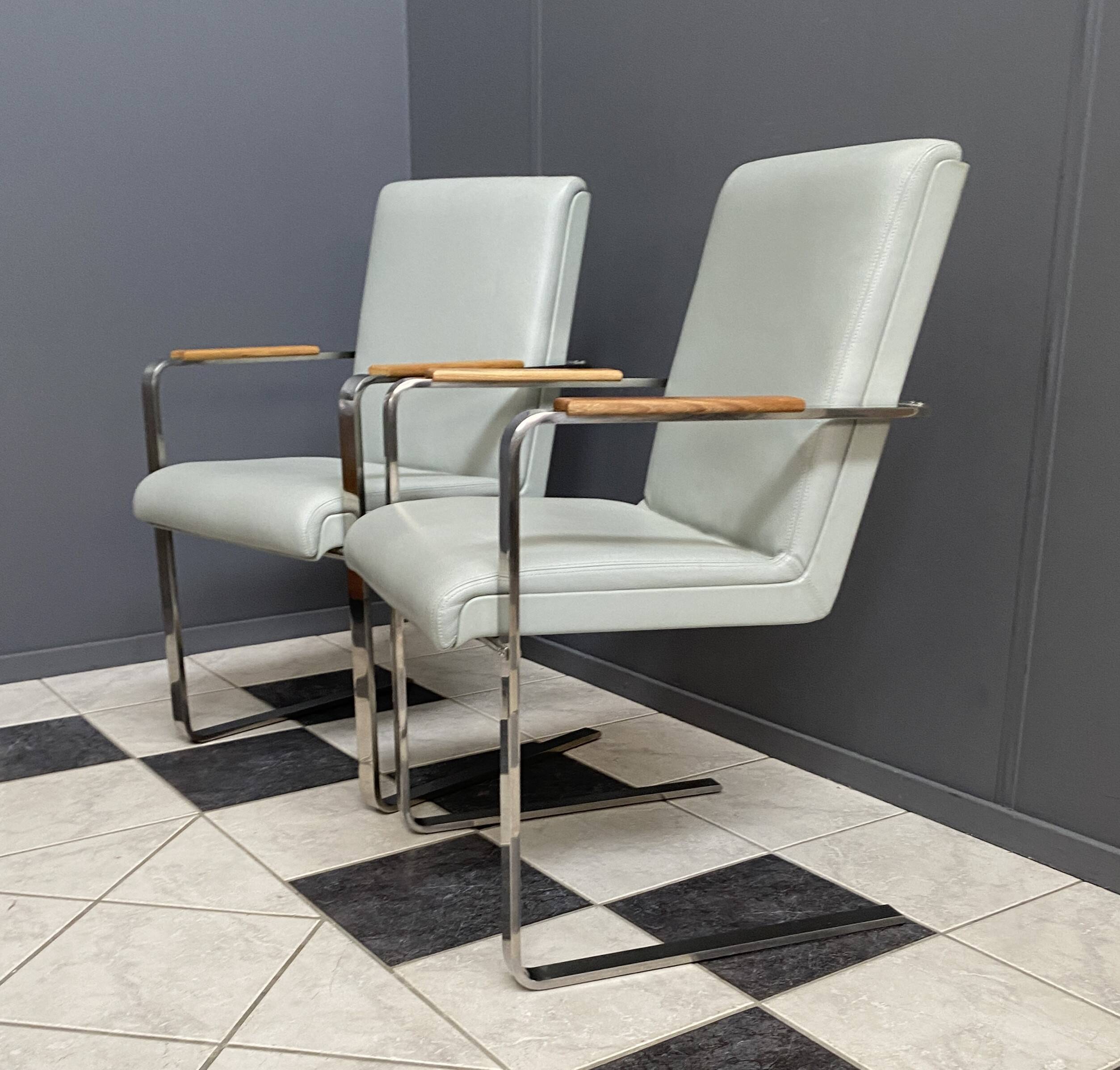 Unique Chrome and grey leather chairs made on demand 1980s