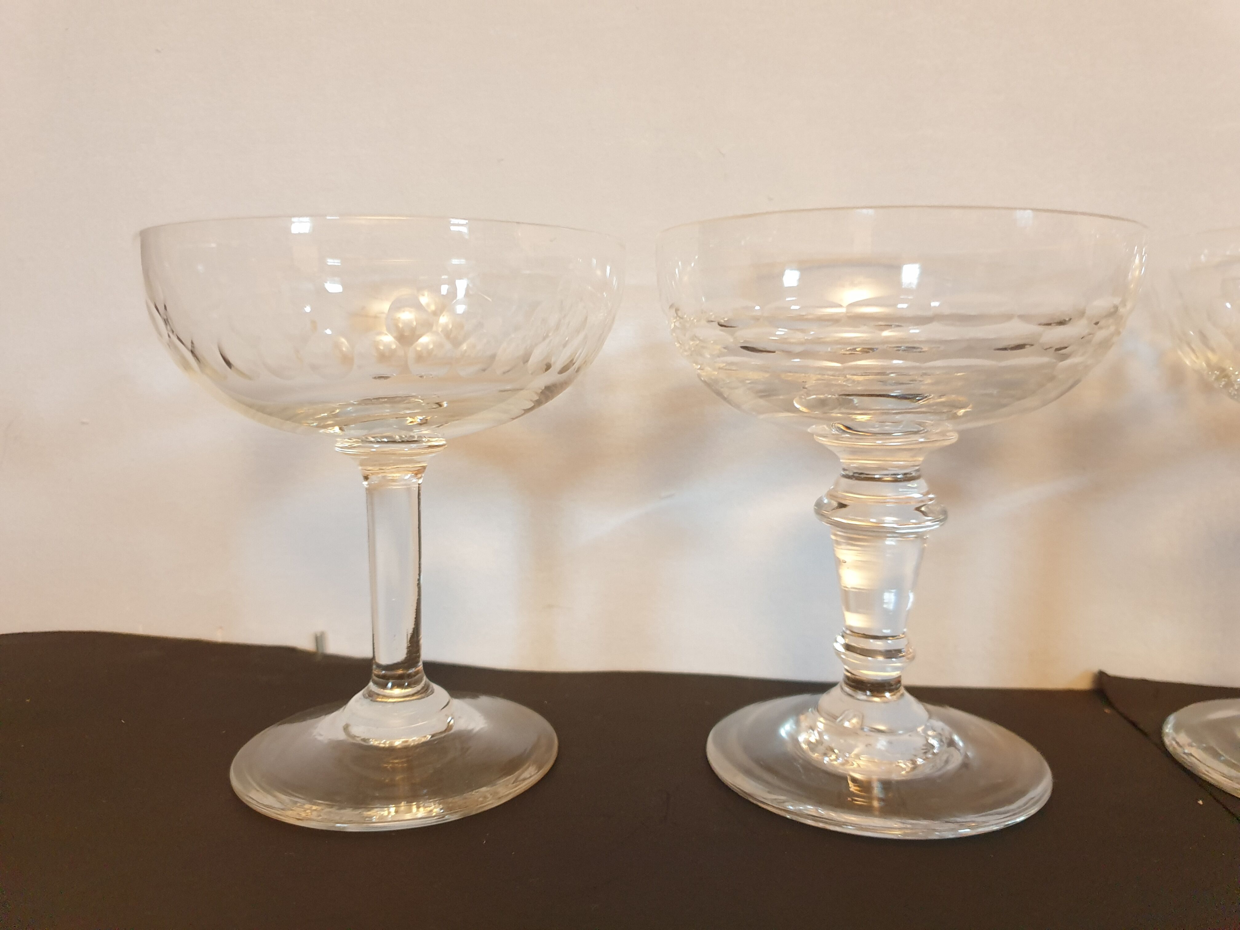Assorted 7 engraved crystal Champagne cups.
