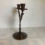 Candle holders in the shape of art deco butterfly wings