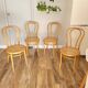 Four cane bistro chairs
