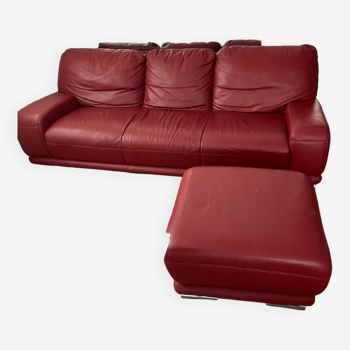 Red leather sofa with ottoman