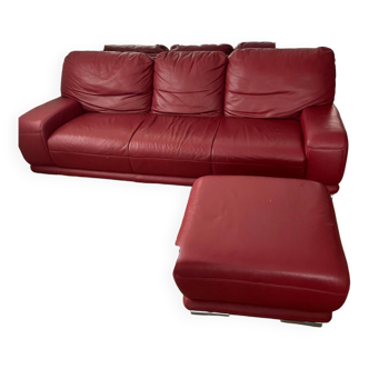 Red leather sofa with ottoman