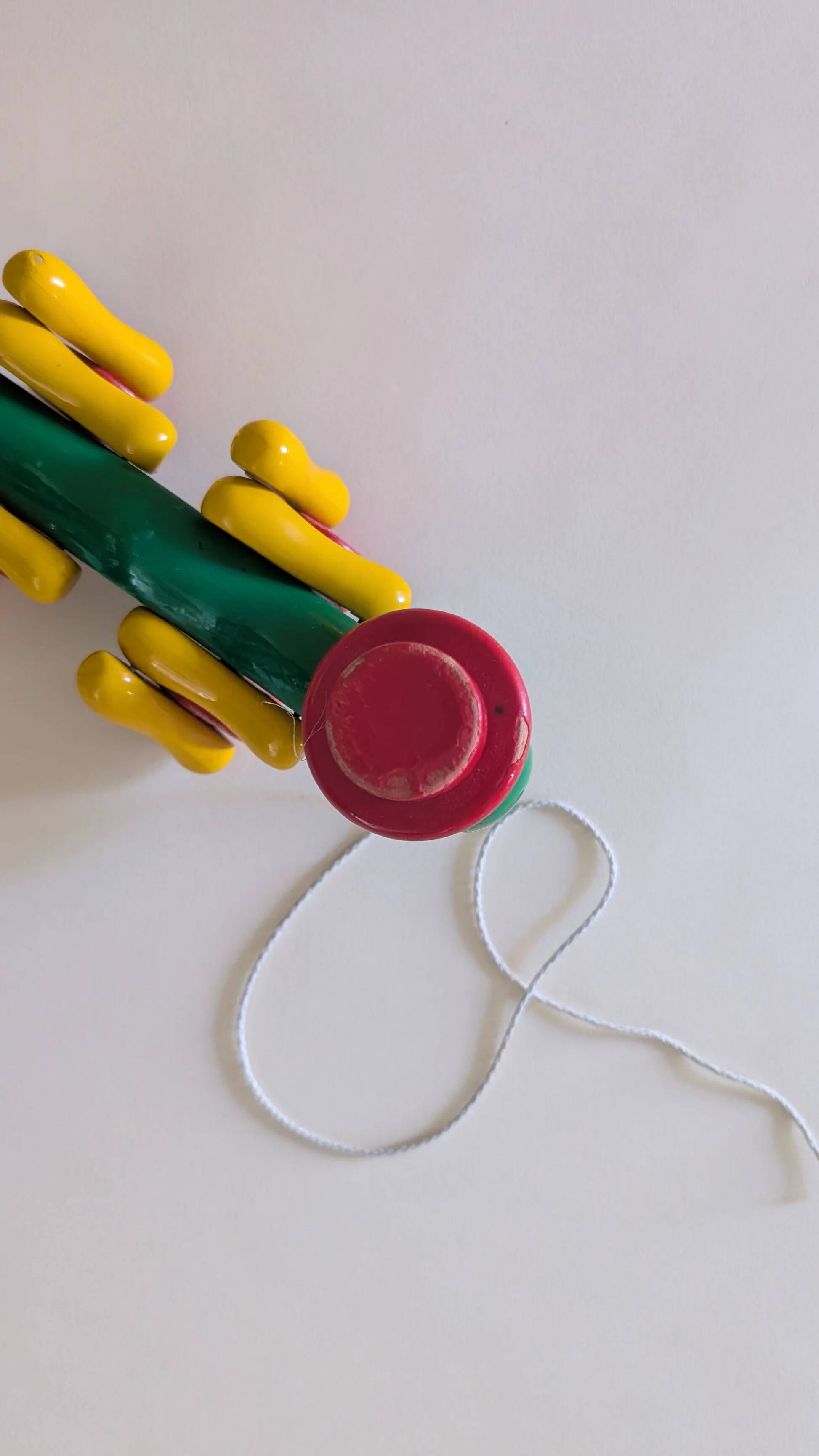 Grilllon, Kouvalias wooden pull toy