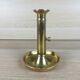 Brass pusher candle holder