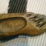 Ashtray in carved and polished stone.