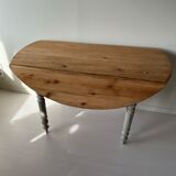Round wooden table with flaps