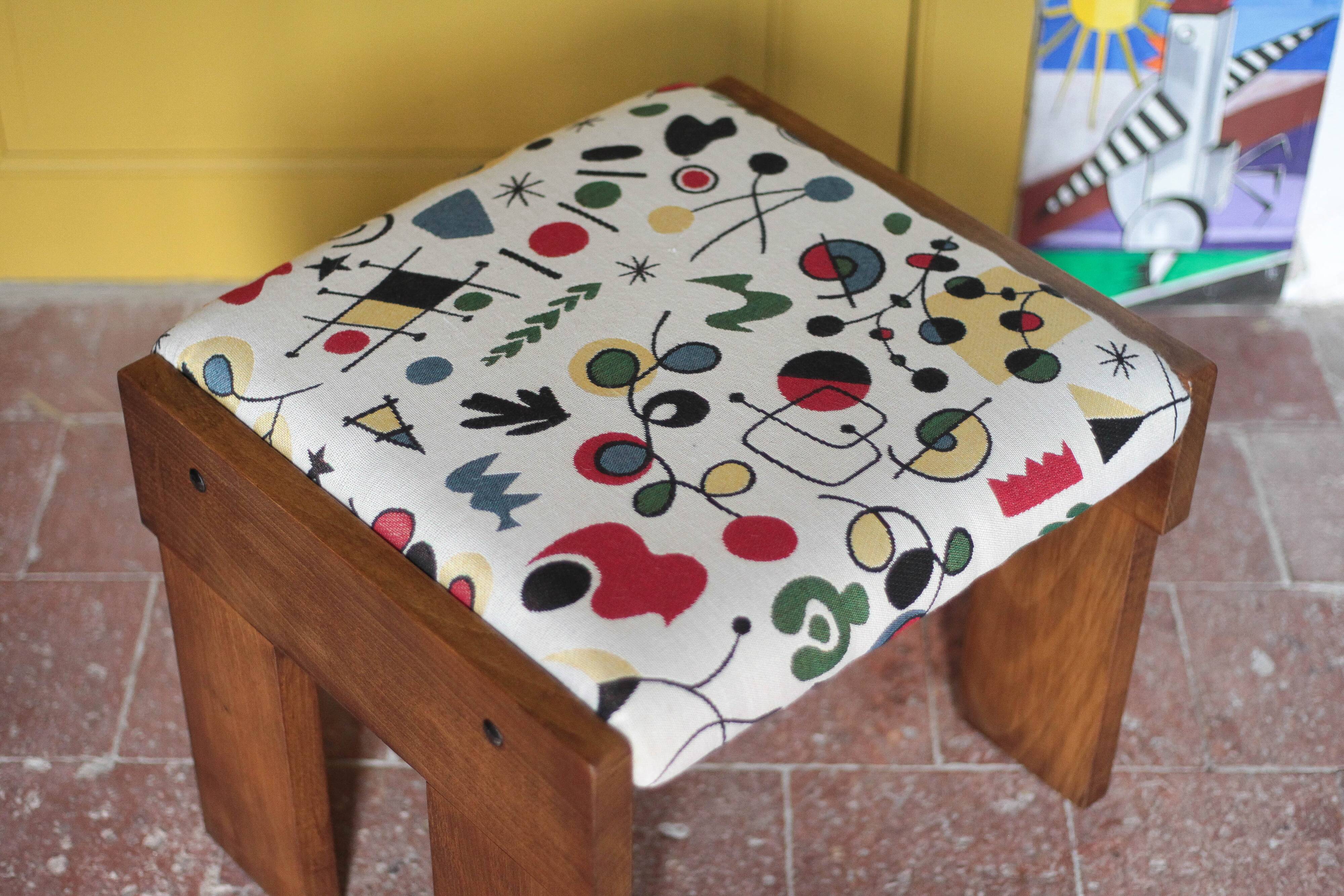 Set of 3 beech wood stools with fabric upholstery in the style of Miro.