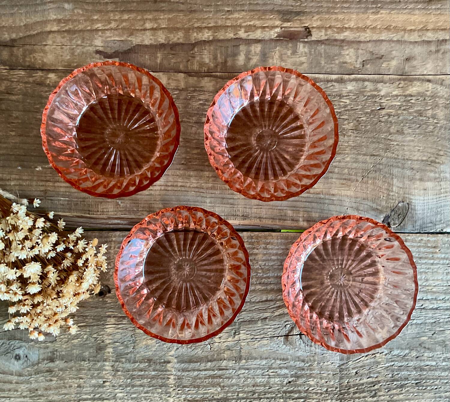 4 pink glass bowls