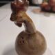 Ceramic salt cellar shaped like a small hen.