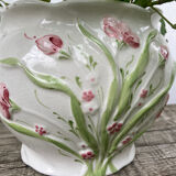 White ceramic pot cache in old flower slip