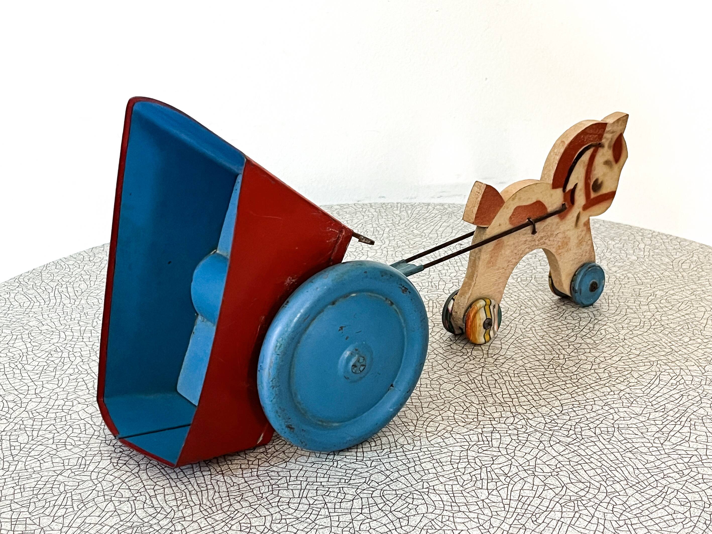 Horse cart and tin cart, old pull toy.
