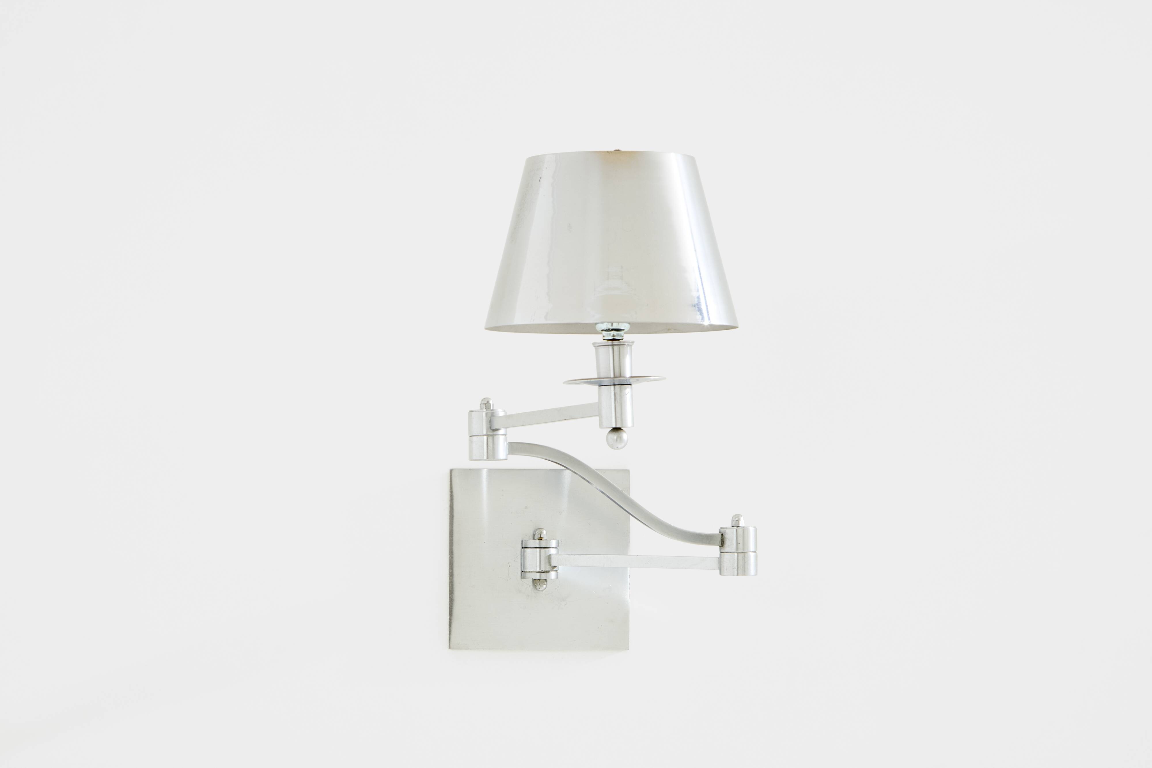 Maison Charles adjustable wall light, brushed steel, circa 1960