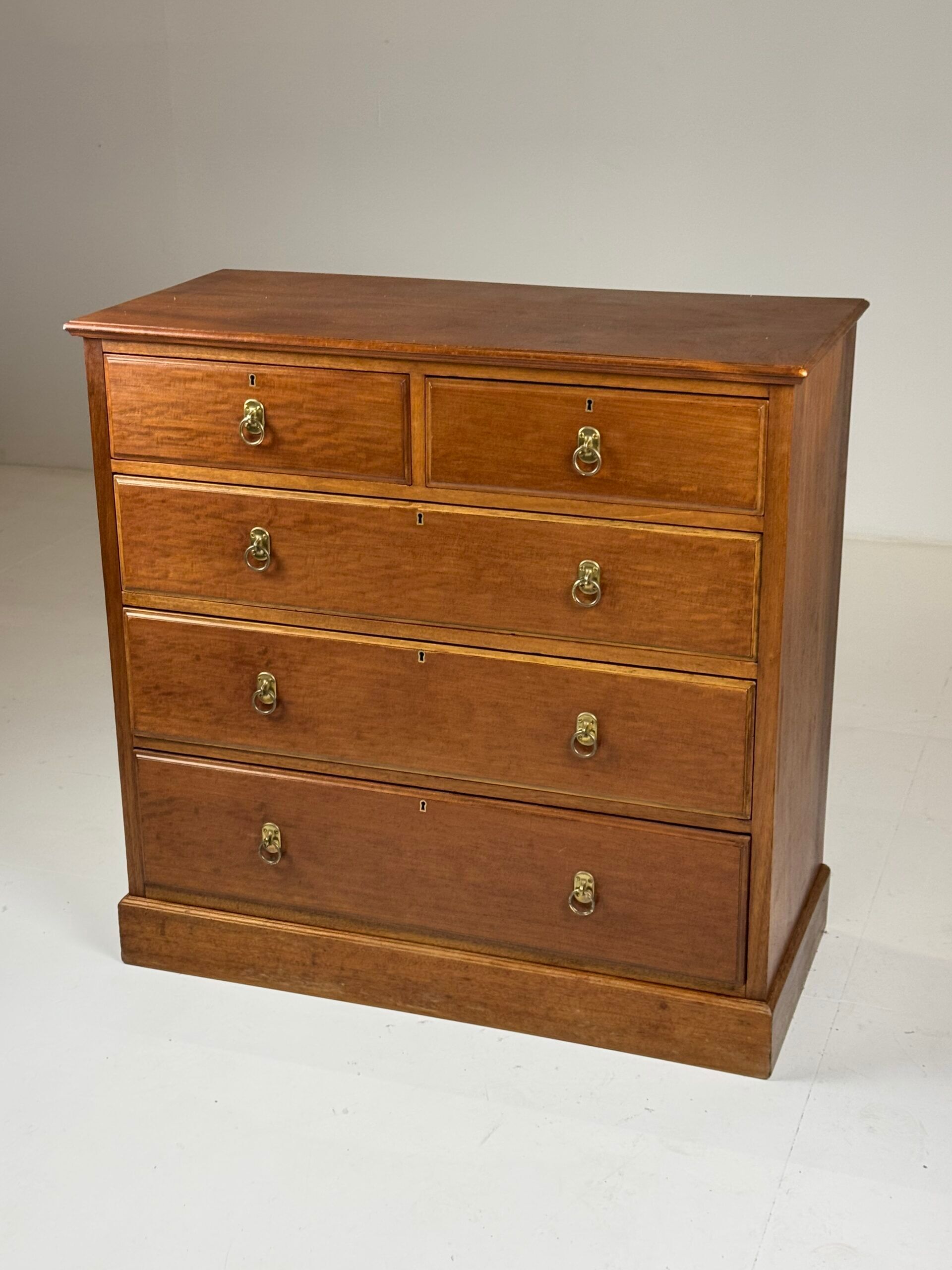 Harrods mahogany chest of drawers