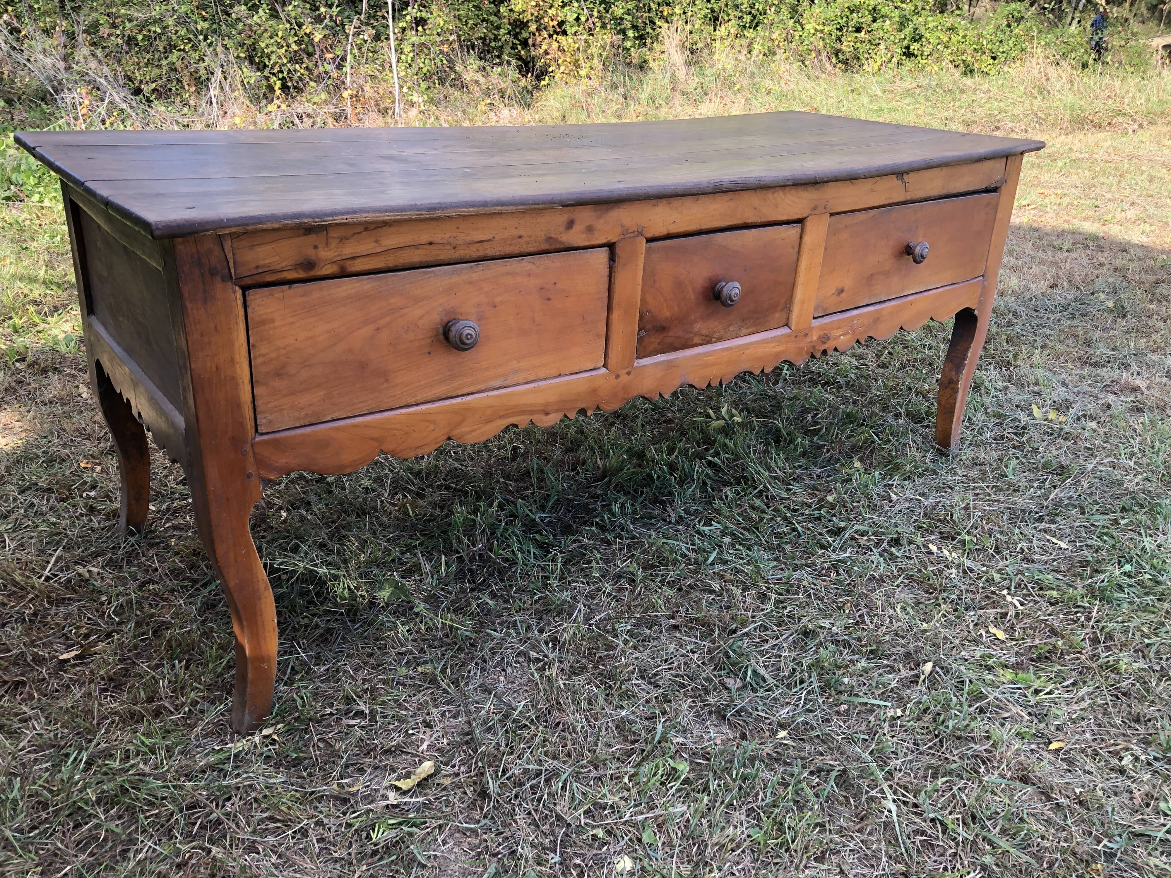 Antique Louis XV paneled table with 3 front drawers in solid cherry wood