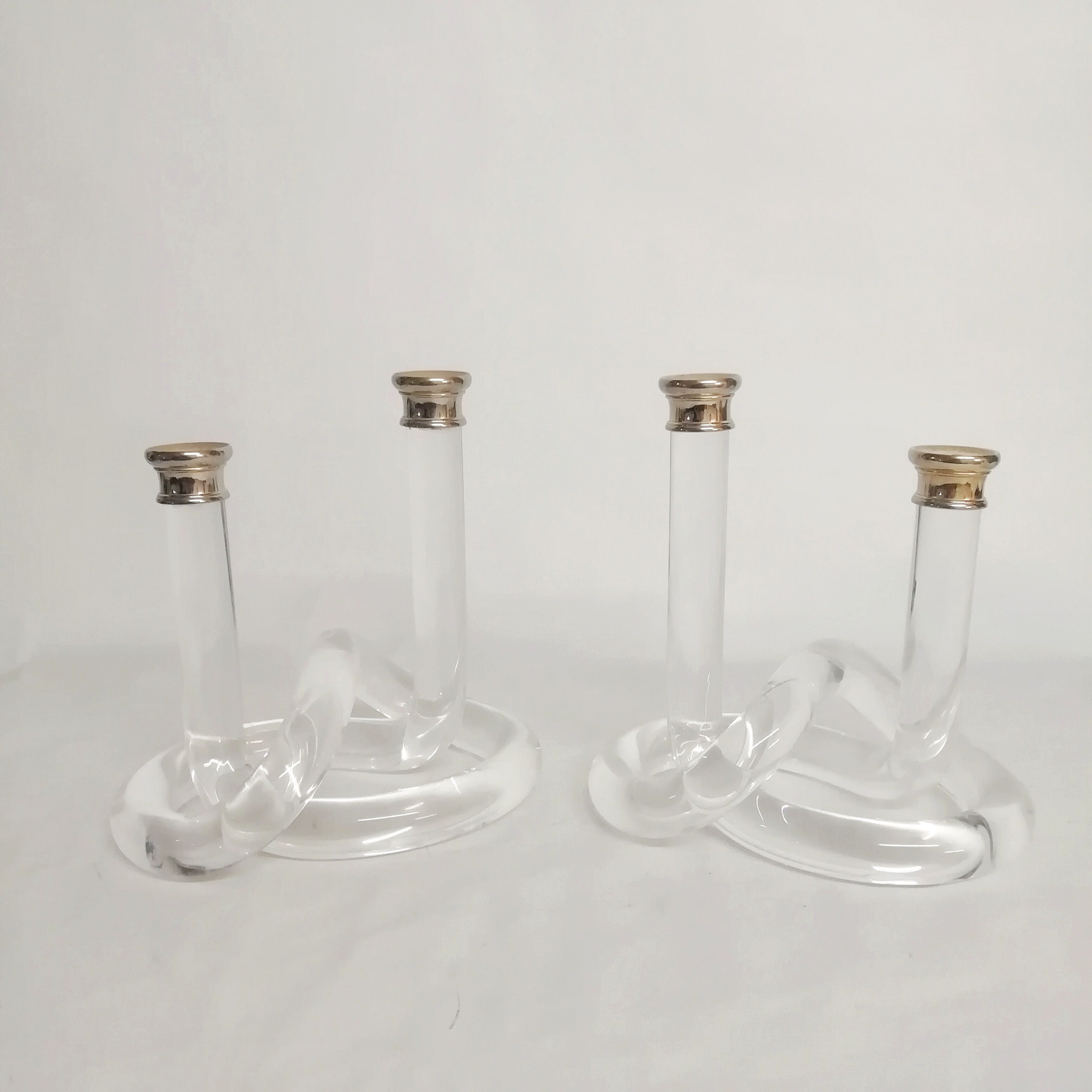Pair of Dorothy Thorpe's "pretzel" lucite candlestiks 1960