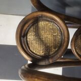 Authentic vintage wicker rattan plant stand planter.