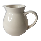 Milk in ceramic pot