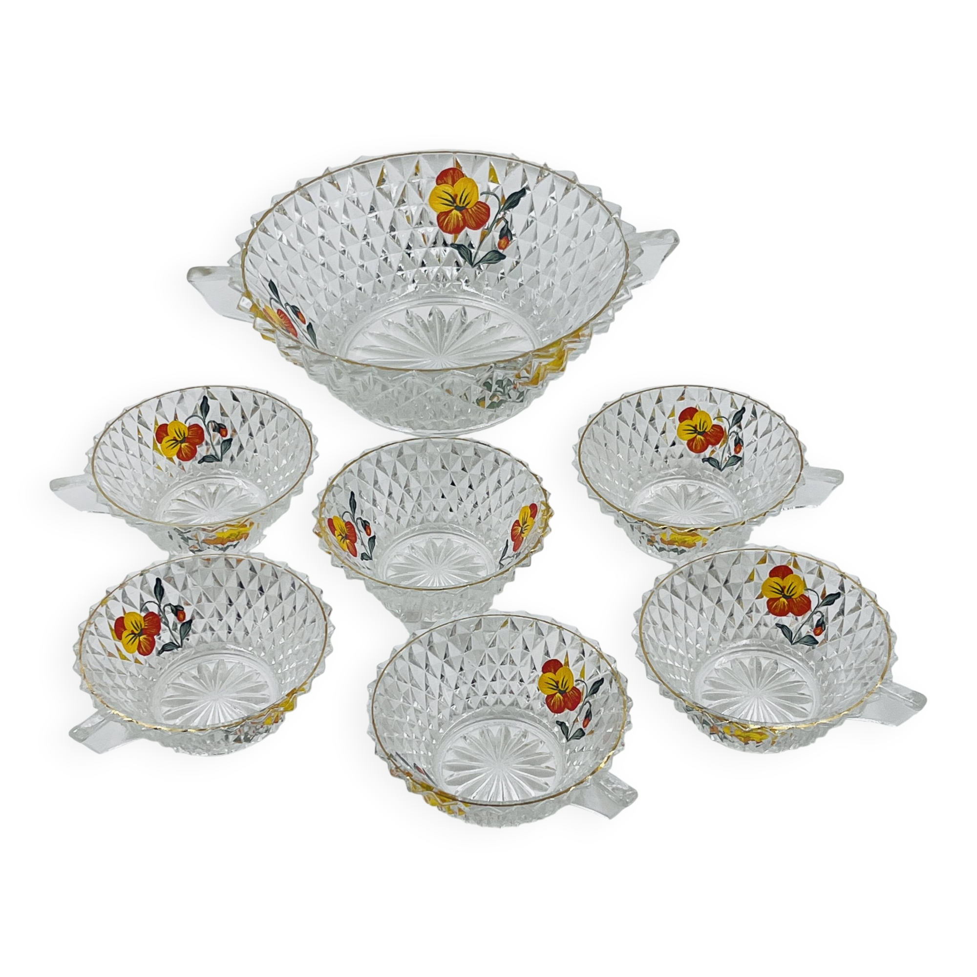 Vintage glass fruit salad serving set with a pansy design.