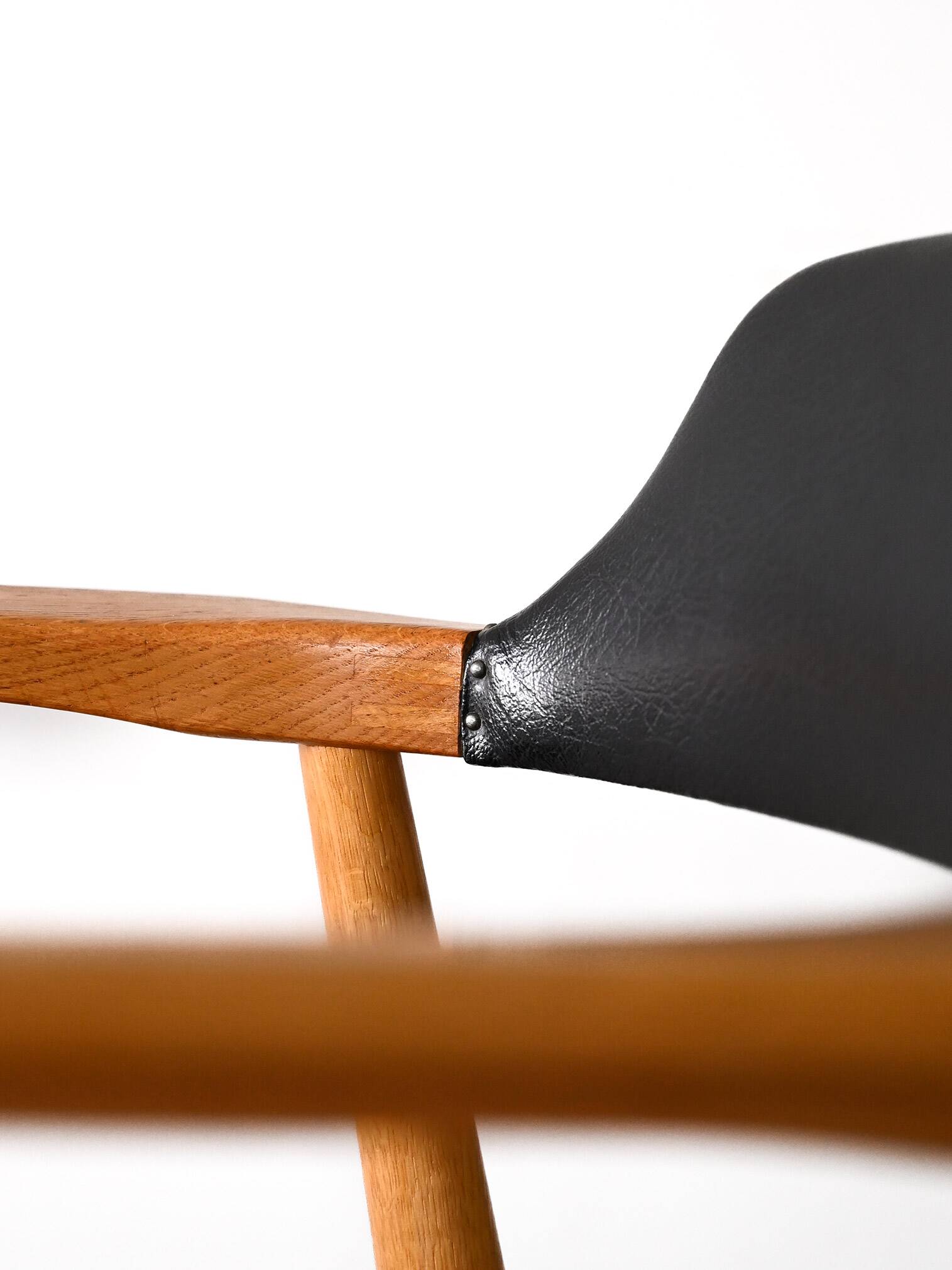 Scandinavian armchair covered in imitation leather