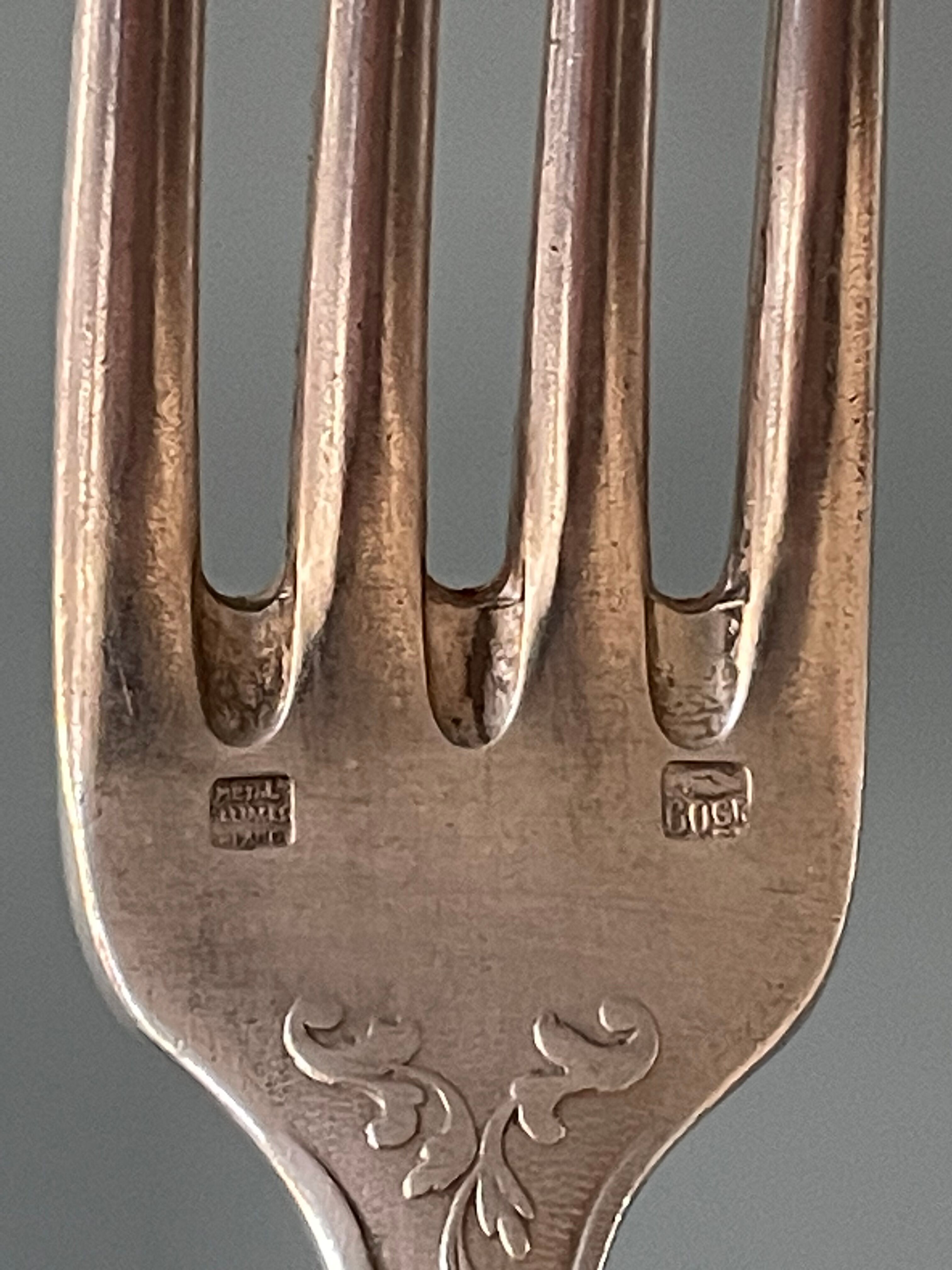 Series of 21 antique silver metal table forks