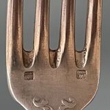 Series of 21 antique silver metal table forks