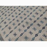 White and blue rug with Berber patterns, hand-woven in natural wool