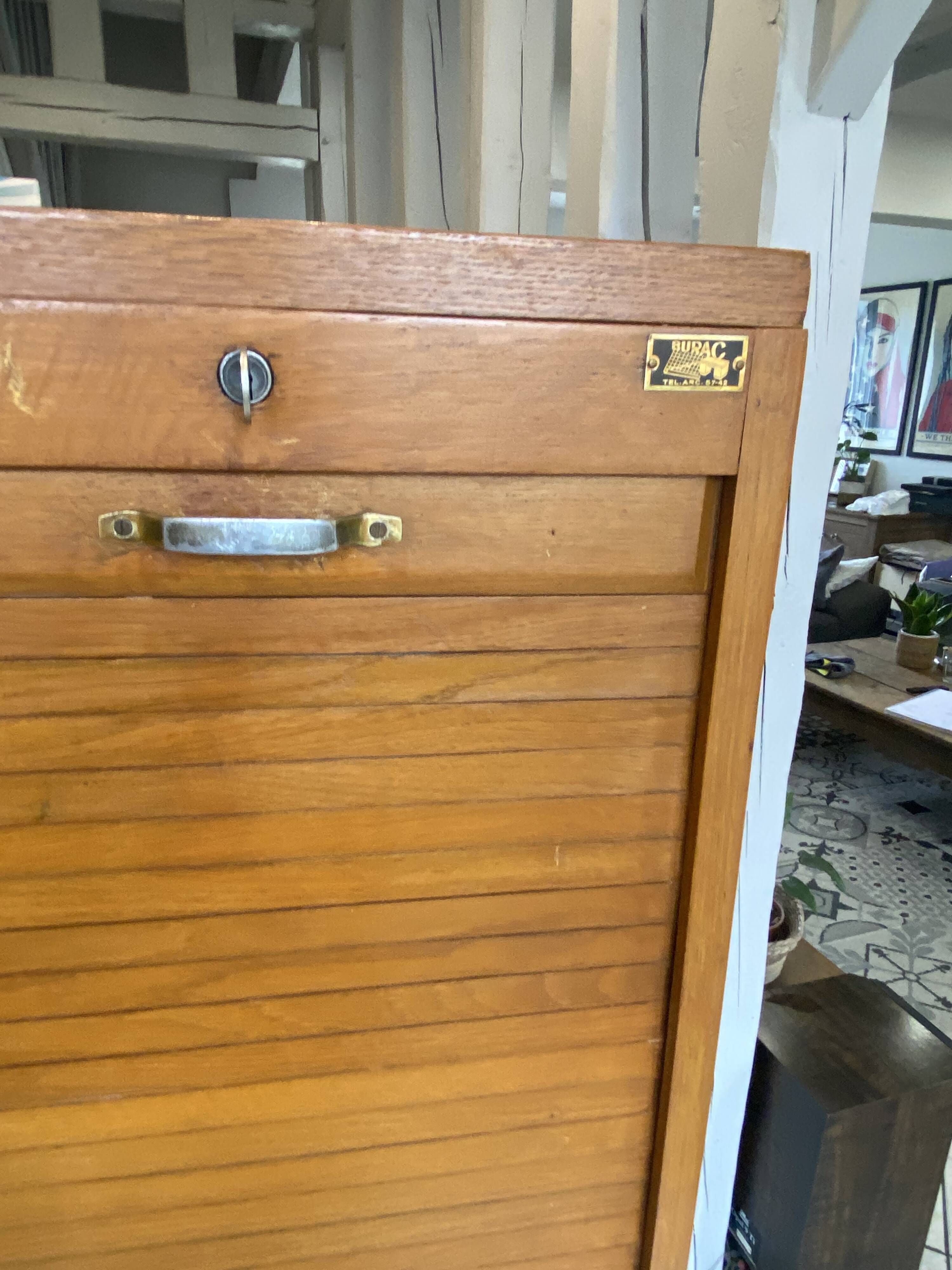 1950s oak office storage cabinet with curtains.