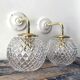 Pair of brass and glass wall sconces