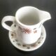 Pot à lait avec soucoupe