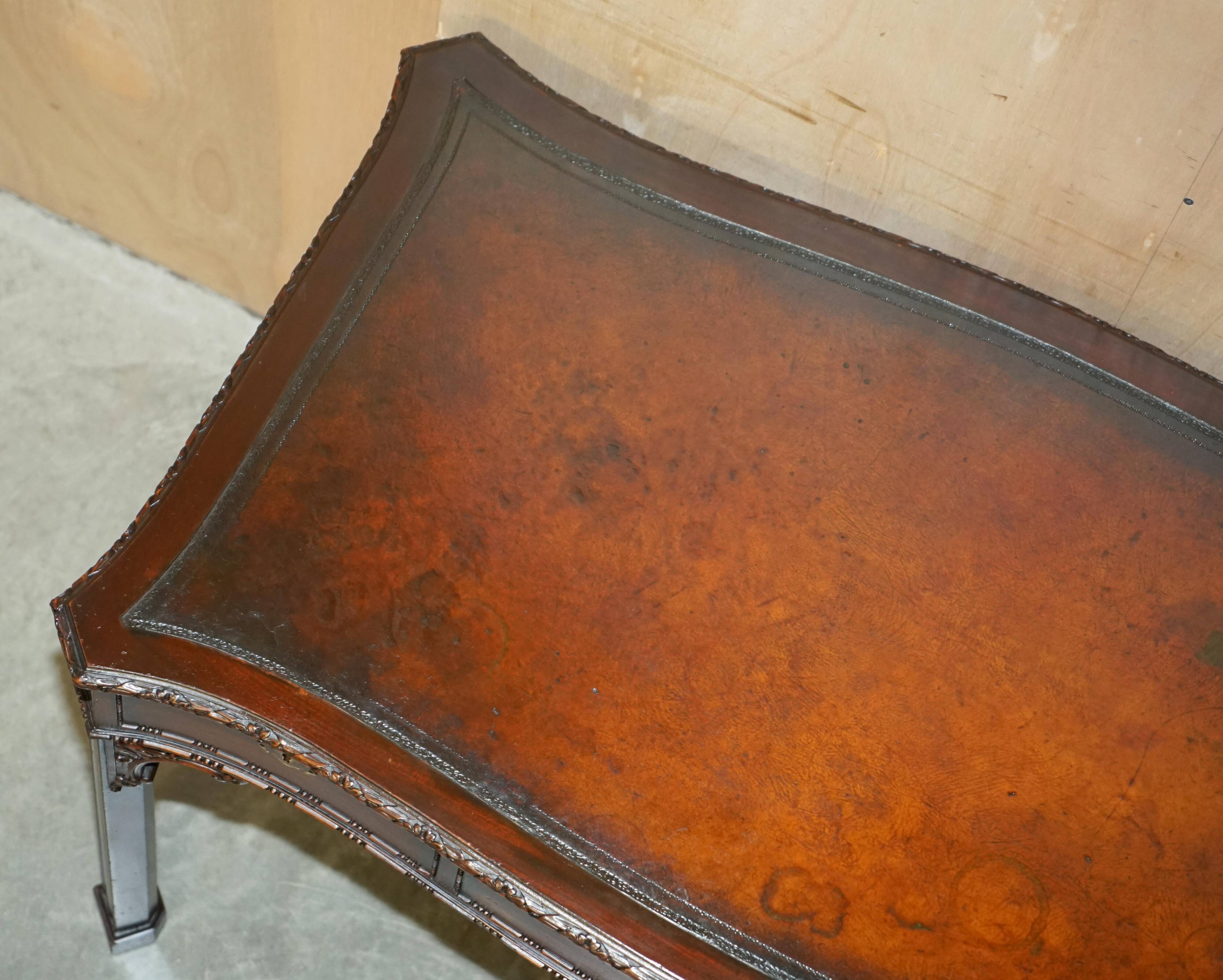 WARING & GILLOW library desk in the style of Thomas Chippendale with a leather top.