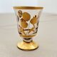 Liqueur service, 1 carafe & 6 small glasses, golden floral decoration.