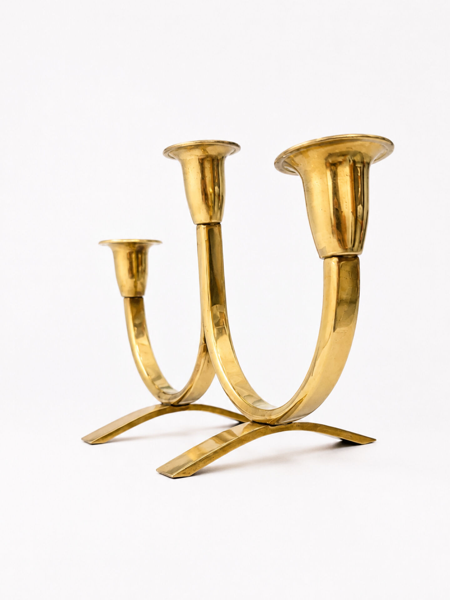 Candelabrum in brass attributed to Gunnar Ander, Ystad, Sweden, mid-20th century.
