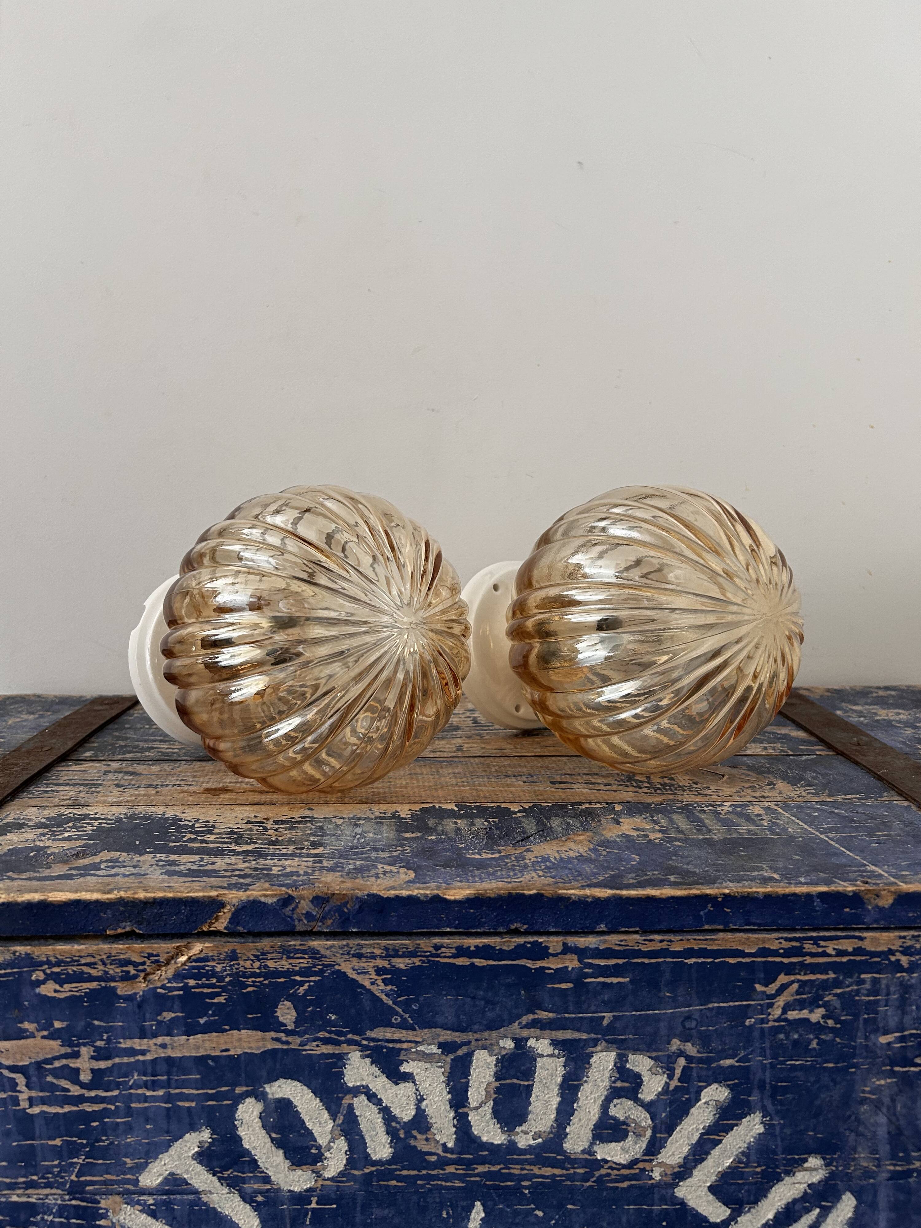 Pair of vintage golden globe wall or ceiling lights