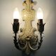 Pair of Italian wall lights in cream-colored sheet metal. 1970s
