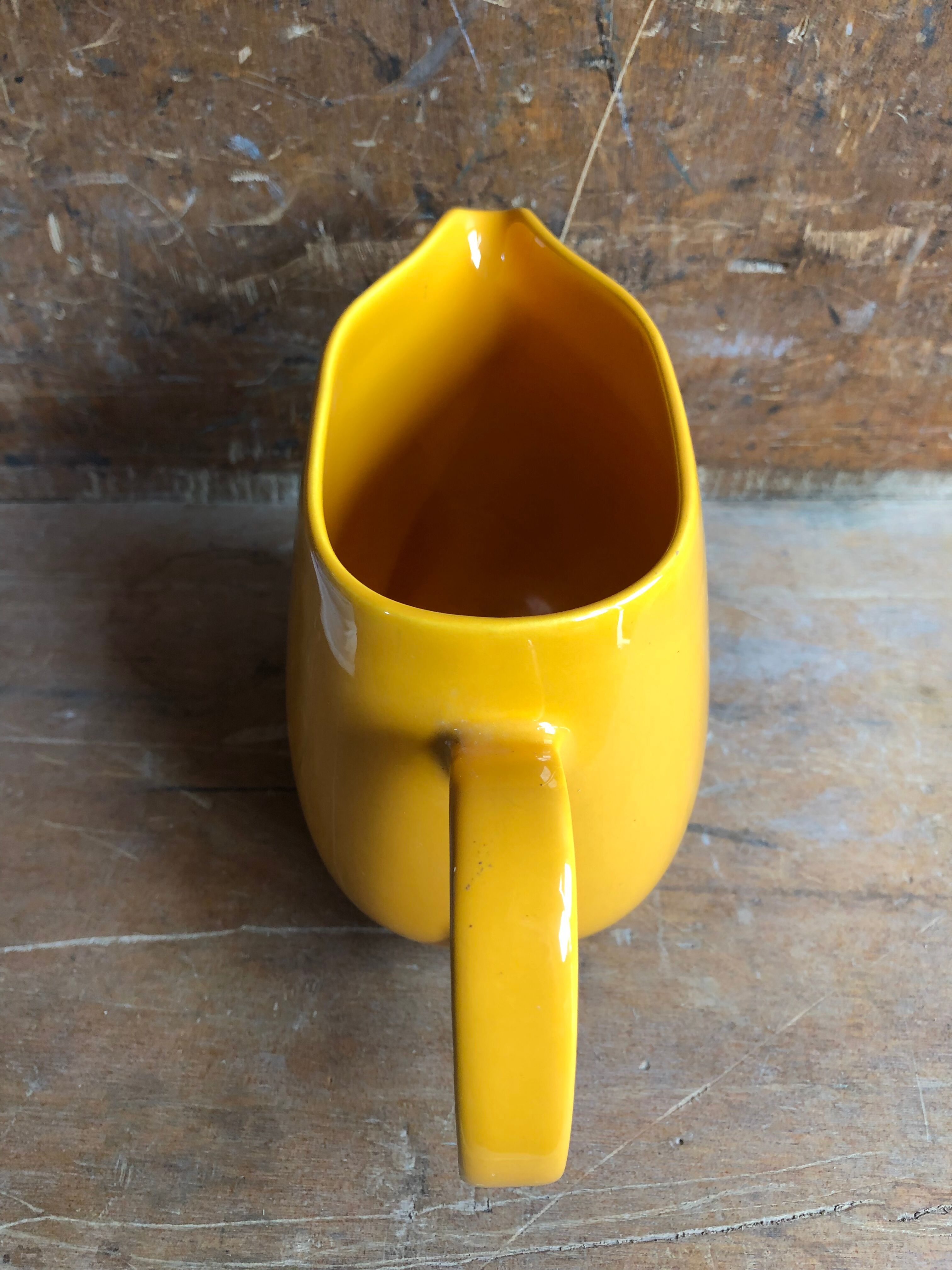 Old yellow ceramic pitcher made in germany 70s vintage