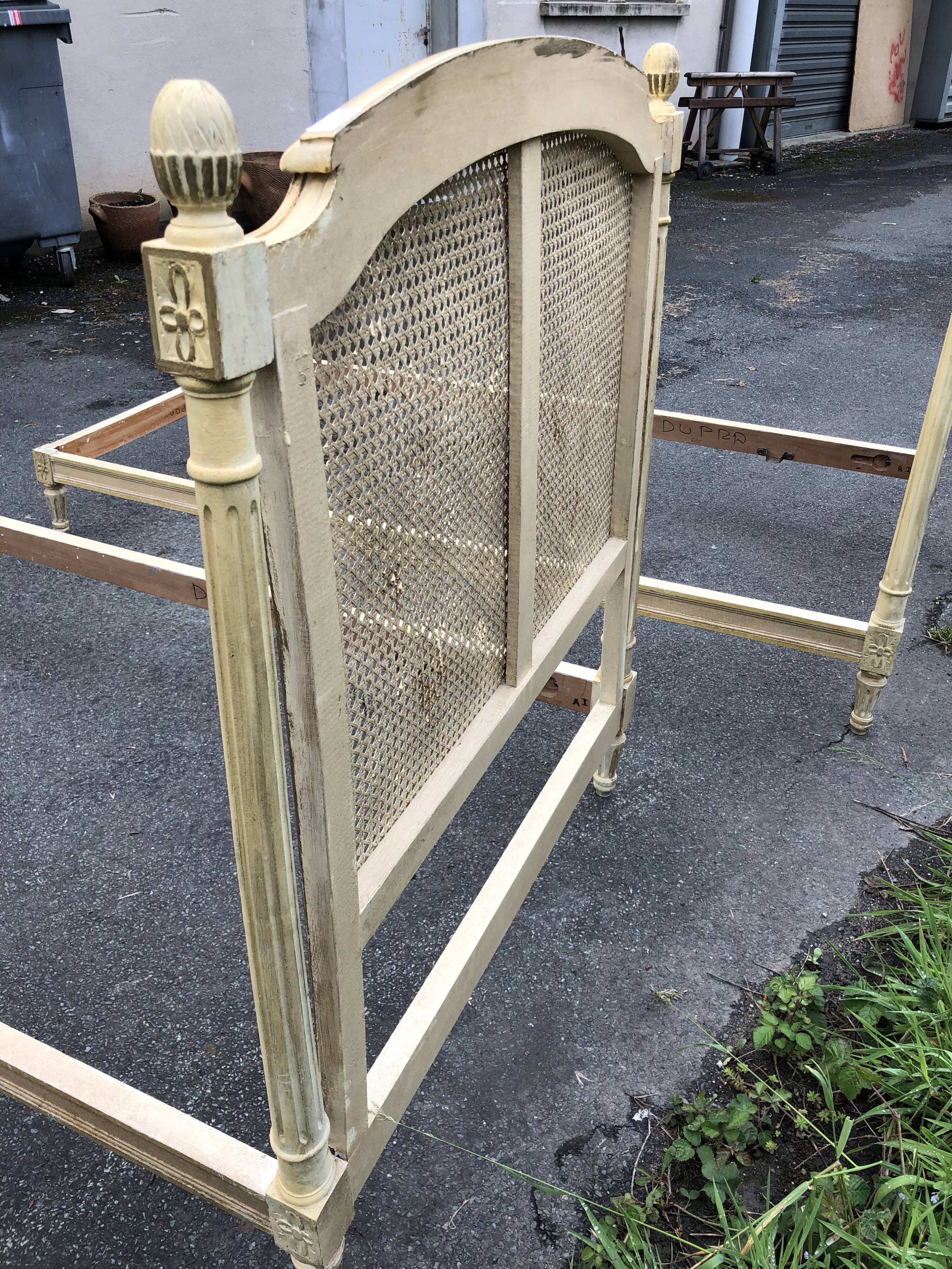 Pair of twin bed Louis XVI caned painted patinated