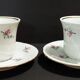 Pair of 20th century Couleuvre porcelain coffee cups