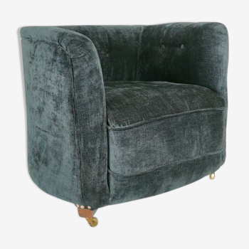 19th century black upholstered victorian tub chair on brass casters