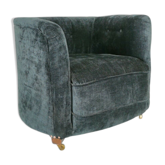 19th century black upholstered victorian tub chair on brass casters