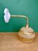 Vintage globe angled wall light in yellow and gold granite glass