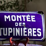 Former French street name plaque in bulging enamel led sheet "Montée des Tupinieres"