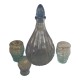 Liquor service consisting of a blue glass decanter and. 3 small antique glasses