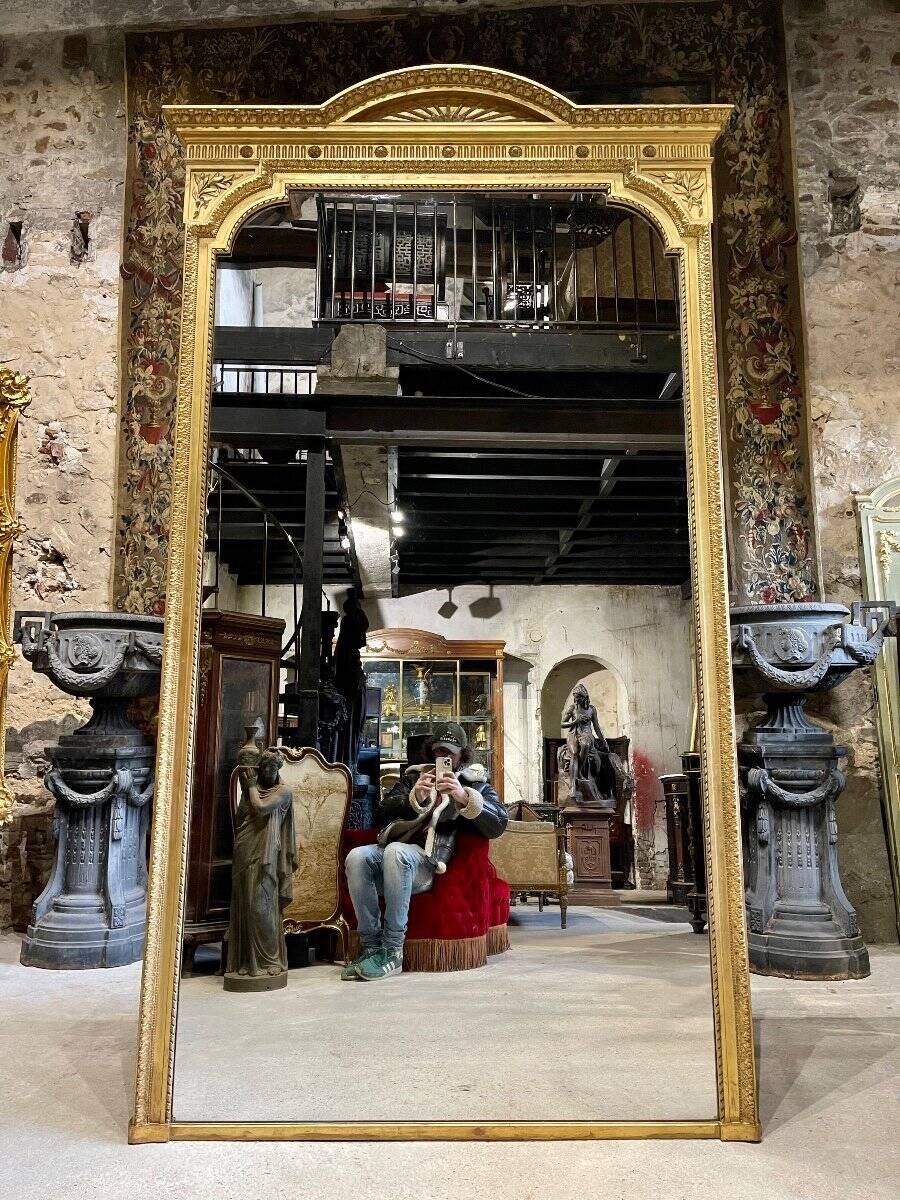 Louis XVI style gilded wood mirror from the Napoleonic III era, 2.75m x 1.48m.
