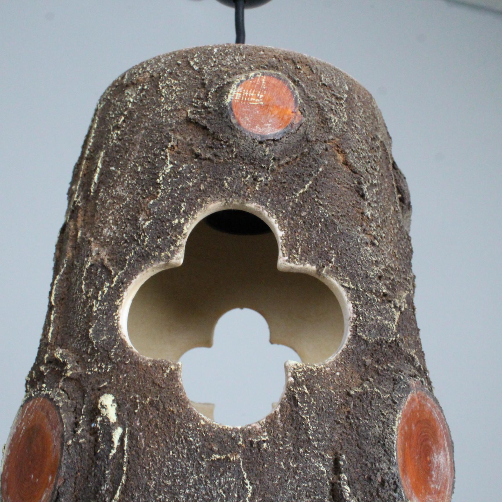 suspended lamp in brutalist ceramic France 1950
