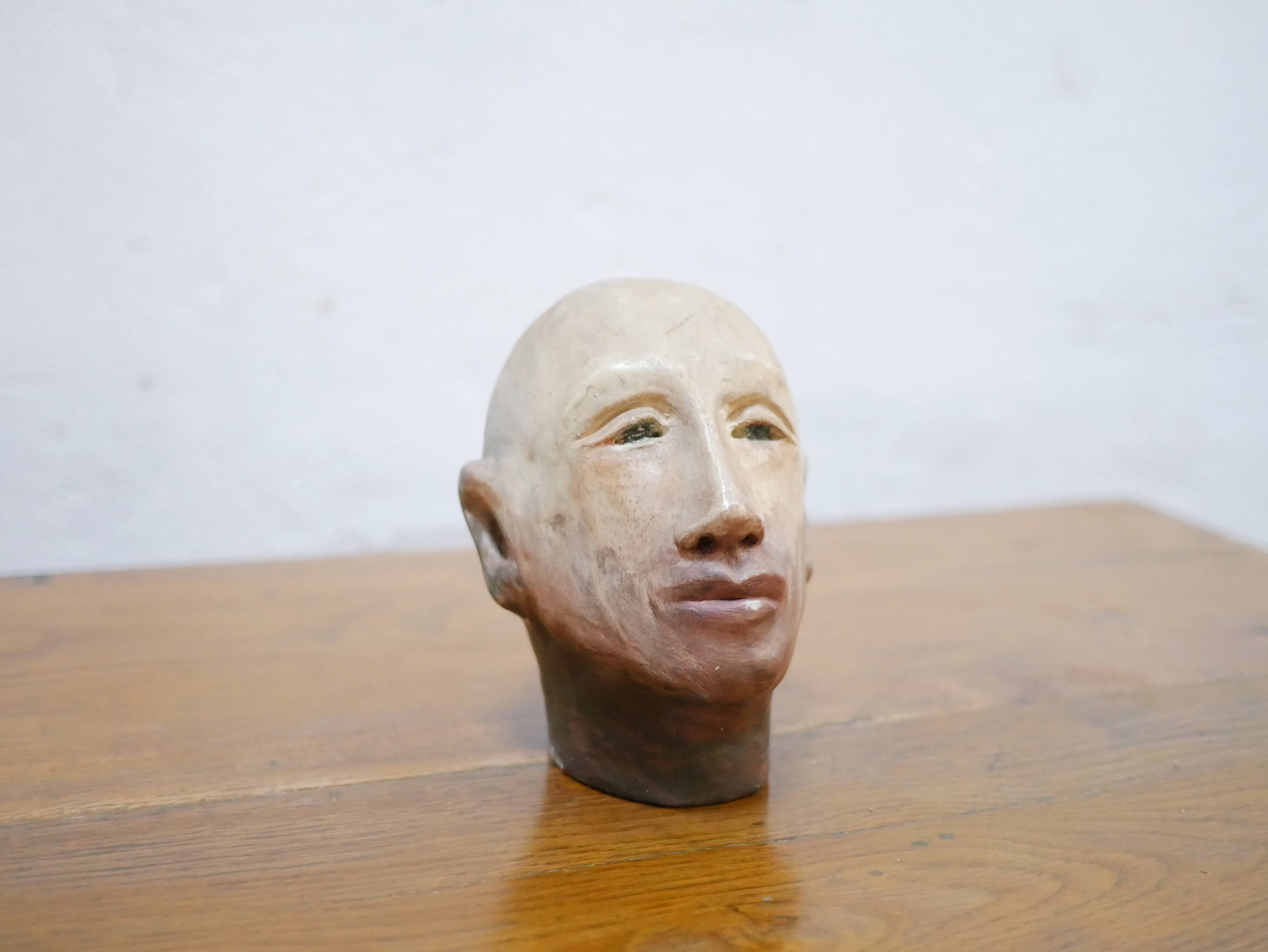 Terracotta head sculpture
